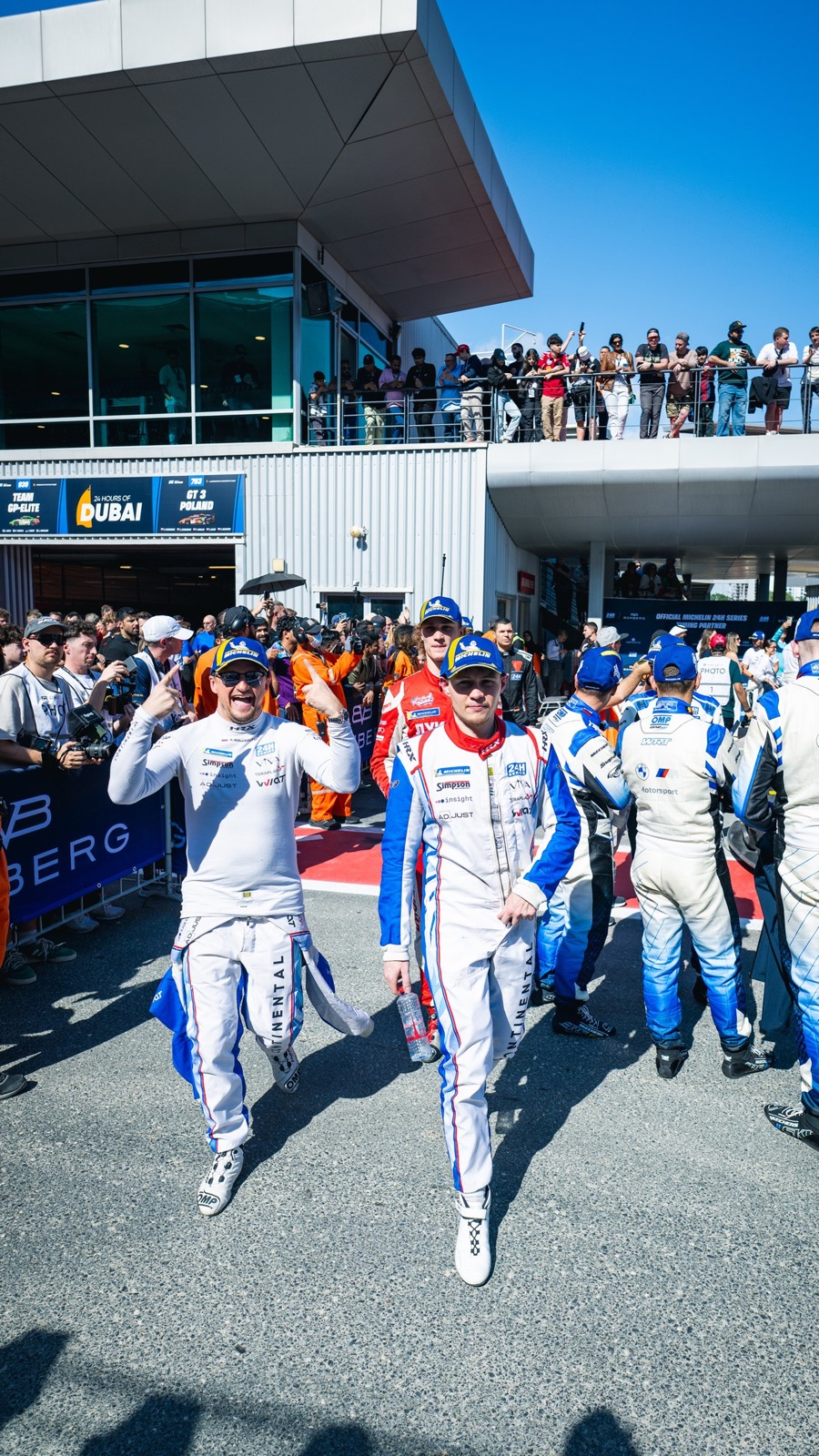 Drivers walking out past the crowd after the race, Dubai 24 Hour 2026